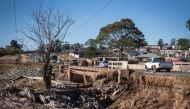 This photo taken on June 13, 2025 shows a flood-damaged bridge where a scholar transport minibus carrying 11 school children and 2 adults was swept away during the floods in Mthatha, Eastern Cape Province, South Africa. (Photo by Johan Van Eeden/Xinhua)