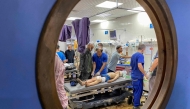 Palestinians who were injured in Israeli fire as they gathered near a food aid centre, receive care at Khan Yunis' Nasser hospital in the southern Gaza Strip on June 17, 2025. (Photo by AFP)