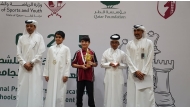 Officials with winning students on the occasion.
