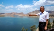 Kochar Jamal Tawfeeq, director of the Dukan Dam facility, by the reservoir northwest of Iraq's northeastern city of Sulaimaniyah in the autonomous Kurdistan region on June 4, 2025. (Photo by Shwan MOHAMMED / AFP)