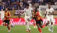 Chelsea's English defender #34 Josh Acheampong and Esperance's Ivory Coast midfielder #21 Abdramane Konate fight for the ball at the Lincoln Financial Field stadium in Philadelphia on June 24, 2025. (Photo by Franck Fife / AFP)