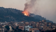 This photograph shows a wildfire moving towards the village of Agios Georgios on the Greek island of Chios on June 23, 2025. Photo by Dimitris Tosidis / AFP