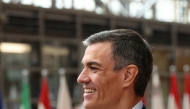 Spain's Prime Minister Pedro Sanchez speaks to the press as he arrives to attend the European Council in Brussels on June 26, 2025. (Photo by Alain Jocard / AFP)