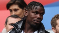 File photo. French midfielder paul Pogba (L) attends the UEFA Euro 2024 round of 16 football match between France and Belgium at the Duesseldorf Arena in Duesseldorf on July 1, 2024. (Photo by FRANCK FIFE / AFP)

