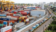 Container cranes lie non-operational at the Chittagong Port in Chittagong on June 29, 2025, as export and import activities remained suspended due to an ongoing protest by employees of the National Board of Revenue (NBR) over reform issues by Bangladesh's interim government. (Photo by AFP)