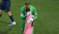 Paris Saint-Germain's Italian goalkeeper #01 Gianluigi Donnarumma greets Inter Miami's Argentine forward #10 Lionel Messi at the end of the FIFA Club World Cup 2025 round of 16 football match between France's Paris Saint-Germain and US Inter Miami at the Mercedes-Benz Stadium in Atlanta on June 29, 2025. (Photo by JUAN MABROMATA / AFP)
