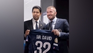 PSG President Nasser Al Khelaifi presented David Beckham with a PSG shirt when the club faced Inter Miami at FIFA Club World Cup.