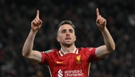 Liverpool's Portuguese striker #20 Diogo Jota celebrates after scoring a goal during the English League Cup third round football match between Liverpool and West Ham United at Anfield in Liverpool, north west England on September 25, 2024. Photo by Paul ELLIS / AFP