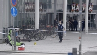 Police works at a cordoned area outside the Ratina shopping centre in Tampere, Finland on July 3, 2025. Photo by Saara Peltola / Lehtikuva / AFP
