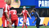 Paris Saint-Germain's French midfielder #14 Desire Doue celebrates scoring his team's first goal during the FIFA Club World Cup 2025 quarterfinal football match between France's Paris Saint-Germain and Germany's Bayern Munich at the Mercedes-Benz Stadium in Atlanta on July 5, 2025. (Photo by PATRICIA DE MELO MOREIRA / AFP)