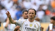 Real Madrid's Croatian midfielder #10 Luka Modric greets fans after winning the FIFA Club World Cup 2025 round of 16 football match between Spain's Real Madrid and Italy's Juventus at the Hard Rock Stadium in Miami on July 1, 2025.