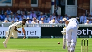 ndia's Nitish Kumar Reddy (L) bowls to England's Joe Root on the opening day of the third cricket test match between England and India at Lord's cricket ground in London, on July 10, 2025. (Photo by Ben STANSALL / AFP) 