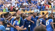 Chelsea's players celebrate their team's victory at the end of the FIFA Club World Cup 2025 final football match between England's Chelsea and France's Paris Saint-Germain at the MetLife Stadium in East Rutherford, New Jersey on July 13, 2025. (Photo by JUAN MABROMATA / AFP)