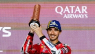 (FILES) Third-placed Aprilia Racing's Spanish rider Jorge Martin celebrates on the podium at the end of the Qatar MotoGP Grand Prix at the Lusail International Circuit in Lusail, north of Doha on April 13, 2025. (Photo by Karim JAAFAR / AFP)

