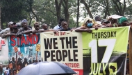 Demonstrators march towards the Capitol building during a protest against the government in Monrovia on July 17, 2025. Photo by Matthew Jacobs / AFP.
