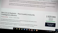 This photograph taken on July 20, 2025 in Le Perreux-sur-Marne, shows a computer screen displaying the French National Assembly's website indicating the number of citizens who signed the petition against the Duplomb law, which surpassed today one million signatures. (Photo by BERTRAND GUAY / AFP)
