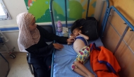 A Palestinian child suffering from malnutrition due to starvation is seen at Al-Rantisi Hospital in northern Gaza City, on July 23, 2025. (Photo by Rizek Abdeljawad/Xinhua)

