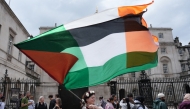 Photo used for representational purposes. A pro-Palestinian supporter waves the Palestinian and Iris flags together on Downing Street in central London, on July 19, 2025, as they take part in a 'National March for Palestine' organised by the Palestine Solidarity Campaign. Photo by CARLOS JASSO / AFP.