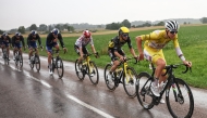 UAE Team Emirates - XRG team’s Slovenian rider Tadej Pogacar (right) leads the pack during the 20th stage.