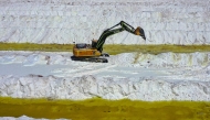 File photo for representation purposes only. Aerial view of brine ponds and processing areas of the lithium mine of the Chilean company SQM (Sociedad Quimica Minera) in the Atacama Desert, Calama, Chile, on September 12, 2022. Photo by Martin BERNETTI / AFP

