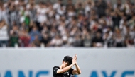 Tottenham Hotspur's captain Son Heung-min reacts as he leaves the field after being substituted during a friendly football match between Tottenham Hotspur and Newcastle United in Seoul on August 3, 2025. (Photo by Anthony WALLACE / AFP)
