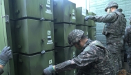 This handout photo taken on August 4, 2025 and provided by the South Korean Defence Ministry shows South Korean soldiers removing loudspeakers that were set up for propaganda broadcasts near the Demilitarized Zone separating the two Koreas in an undisclosed location in South Korea. Photo by Handout / South Korean Defence Ministry / AFP