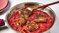 Skillet chicken thighs with plums. (Photo by Peggy Cormary; food styling by Lisa Cherkasky/The Washington Post)