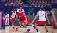 Qatar players during a training session ahead of their opening match against Lebanon. 