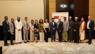 Officials from Swinburne University of Technology and Barzan University College in a group photo.
