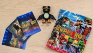 This photo illustration taken on August 7, 2025 shows a small bag of novelty merchandise for the online phenomenon called Italian Brainrot, containing collectable cards and a small figure of Frulli Frulla (C), purchased from a shop in Tokyo. (Photo by AFP) 