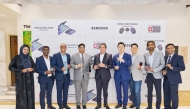 Samsung Electronics Qatar and Dohatna Innovative Distribution officials and others during the launch ceremony.