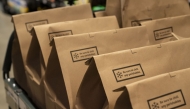 Packed customer orders at an Amazon Fresh grocery store in Seattle, Washington, US, on Thursday, May 2, 2024. Photo credit: David Ryder/Bloomberg
