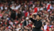 Arsenal's Spanish manager Mikel Arteta watches from the touchline during the pre-season friendly football match between Arsenal and Villarreal at the Emirates Stadium in London on August 6, 2025. (Photo by Glyn KIRK / AFP)
