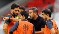 Al Rayyan coach Artur Jorge gives instructions to his players during the match against Al Sailiya.