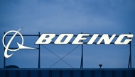 File: The Boeing Co. logo is displayed outside of company offices near Los Angeles International Airport (LAX) in El Segundo, California on January 18, 2024. (Photo by Patrick T Fallon / AFP)