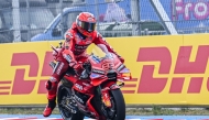 Ducati Lenovo Team's Spanish rider Marc Marquez drives during the practice of motorcycle Hungarian Moto GP Grand Prix on August 22, 2025. (Photo by Attila Kisbenedek / AFP)