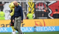 Bayer Leverkusen's Dutch head coach Erik Ten Hag reacts after the German first division Bundesliga football match between Bayer 04 Leverkusen and TSG 1899 Hoffenheim in Leverkusen, western Germany on August 23, 2025. (Photo by INA FASSBENDER / AFP)