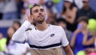 Benjamin Bonzi of France celebrates after defeating Daniil Medvedev on Day One of the 2025 US Open on August 24, 2025. Elsa/Getty Images/AFP