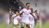 Al Shamal’s Baghdad Bounedjah (foreground) celebrates after scoring against Al Rayyan on Friday.