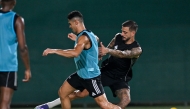 Al Gharafa's Joselu (right) in action with a teammate during a training session.