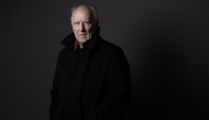 German filmmaker, actor, opera director, and author, Werner Herzog, poses during a photo session in Paris, on December 12, 2024. (Photo by Joel Saget / AFP)
