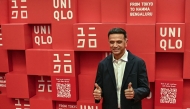Rahul Dravid, former Indian cricketer, gestures during the store launch of Japanese retail store UNIQLO at Orion Mall in Bengaluru, August 29, 2025. (Photo by Idrees Mohammed / AFP)