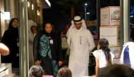 Officials and students during a Back-to-School event.
