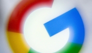 This illustration photograph taken on December 22, 2023, shows the logo of US multinational technology and Internet-related services company Google displayed on a smartphone's screen, in Frankfurt am Main, western Germany. 