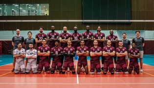 Qatar volleyball team players and officials pose for a photograph in this file photo.