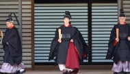 Japanese Prince Hisahito, son of Crown Prince Akishino wearing an ancient ceremonial costume, leaves for a ceremony by a carriage at the Imperial Palace in Tokyo on September 6, 2025. (Photo by Yoshikazu Tsuno / POOL / AFP)