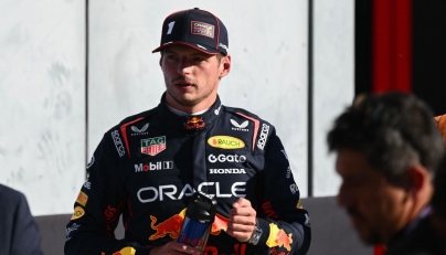 Red Bull Racing's Dutch driver Max Verstappen looks on after taking pole position following the qualifying session ahead of the Italian Formula One Grand Prix at the Autodromo Nazionale Monza circuit, in Monza, northern Italy, on September 6, 2025. (Photo by Philippe Lopez / AFP)