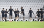 Qatar players take part in a training session yesterday.