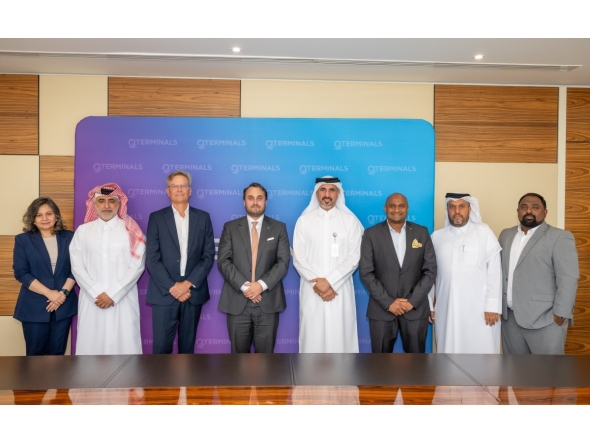 QTerminals and GAC officials pose for a group photo during the agreement signing.
