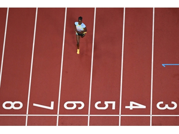 Saint Lucia's athlete Julien Alfred competes in the women's 100m heats during the World Athletics Championships in Tokyo on September 13, 2025. (Photo by Jewel Samad / AFP)